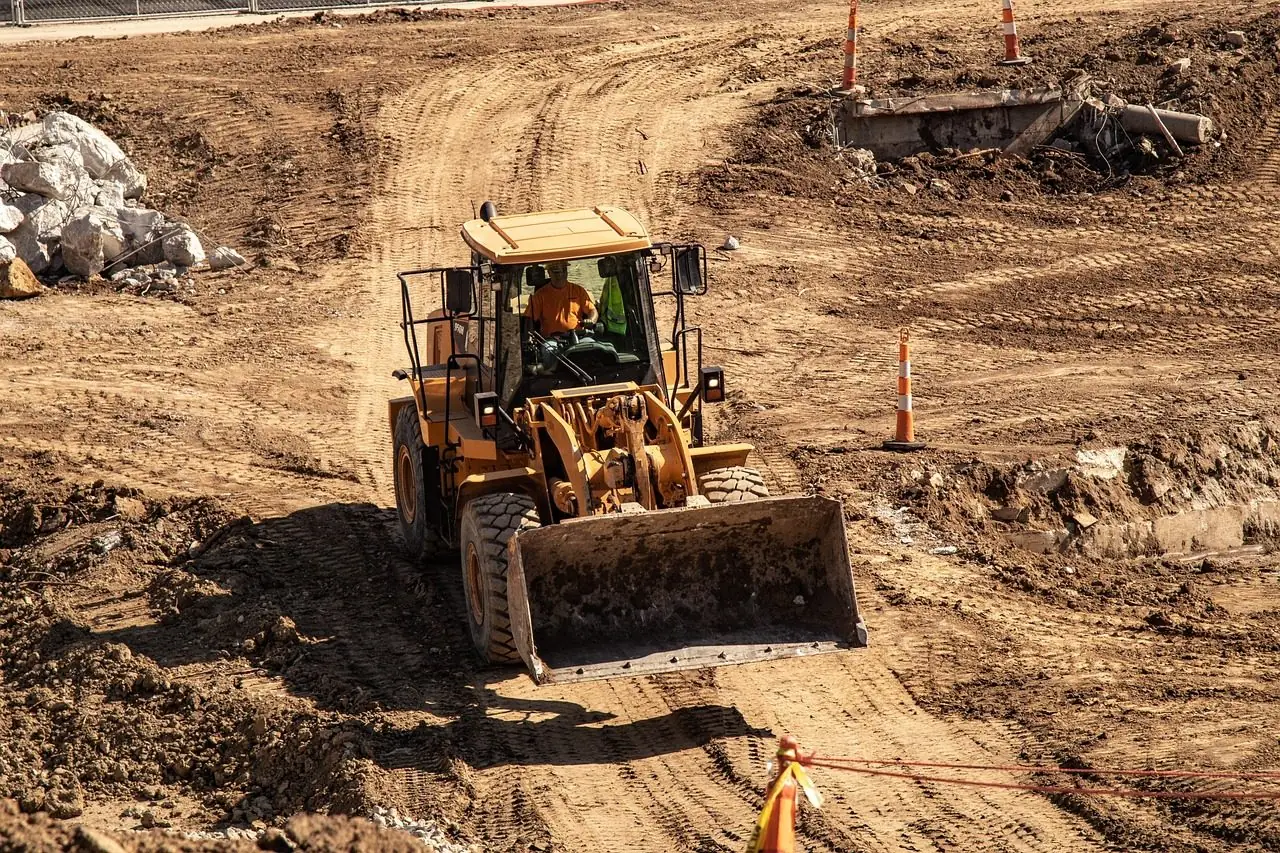 Bulldozer on a staked dirt site